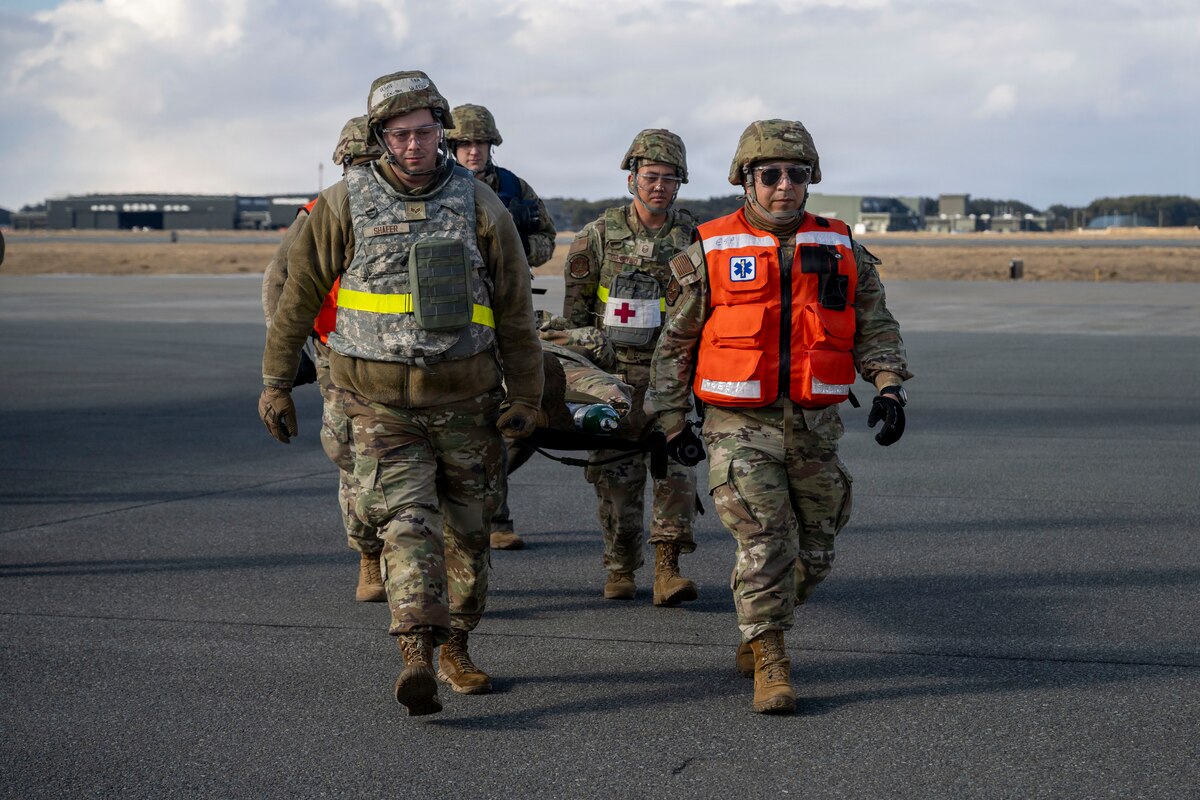 U.S. Airmen assigned to the 35th Medical Group transport a casualty actor during Freedom Lift in support of Exercise Freedom Shield at Misawa Air Base, Japan, March 10, 2026.