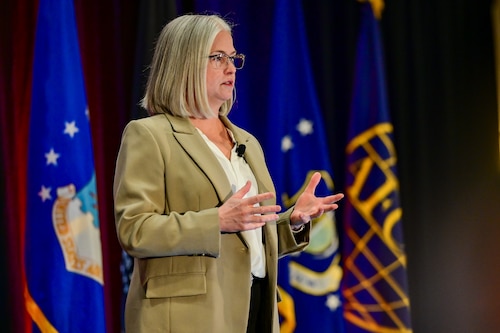 Woman speaking to crowd