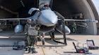 U.S. Air Force Staff Sgt. Cameron Russell, left, and Staff Sgt. John Gegato, both 36th Fighter Generation Squadron F-16 avionics craftsmen, perform maintenance on an F-16 Fighting Falcon during exercise Freedom Shield 26 at Osan Air Base, Republic of Korea, March 10, 2026. The training strengthened coordination between installations while ensuring Airmen can rapidly reposition and continue generating sorties during contingency operations. (U.S. Air Force photo by Senior Airman Rome Bowermaster)