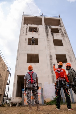 First responders from participating nations of Exercise Cobra Gold 2026 conduct high-angle rope rescue training as part of the humanitarian assistance and disaster response demonstration at the Disaster Relief Training Centre, Phanom Sarakham District, Chachoengsao, Thailand, Feb. 27, 2026.