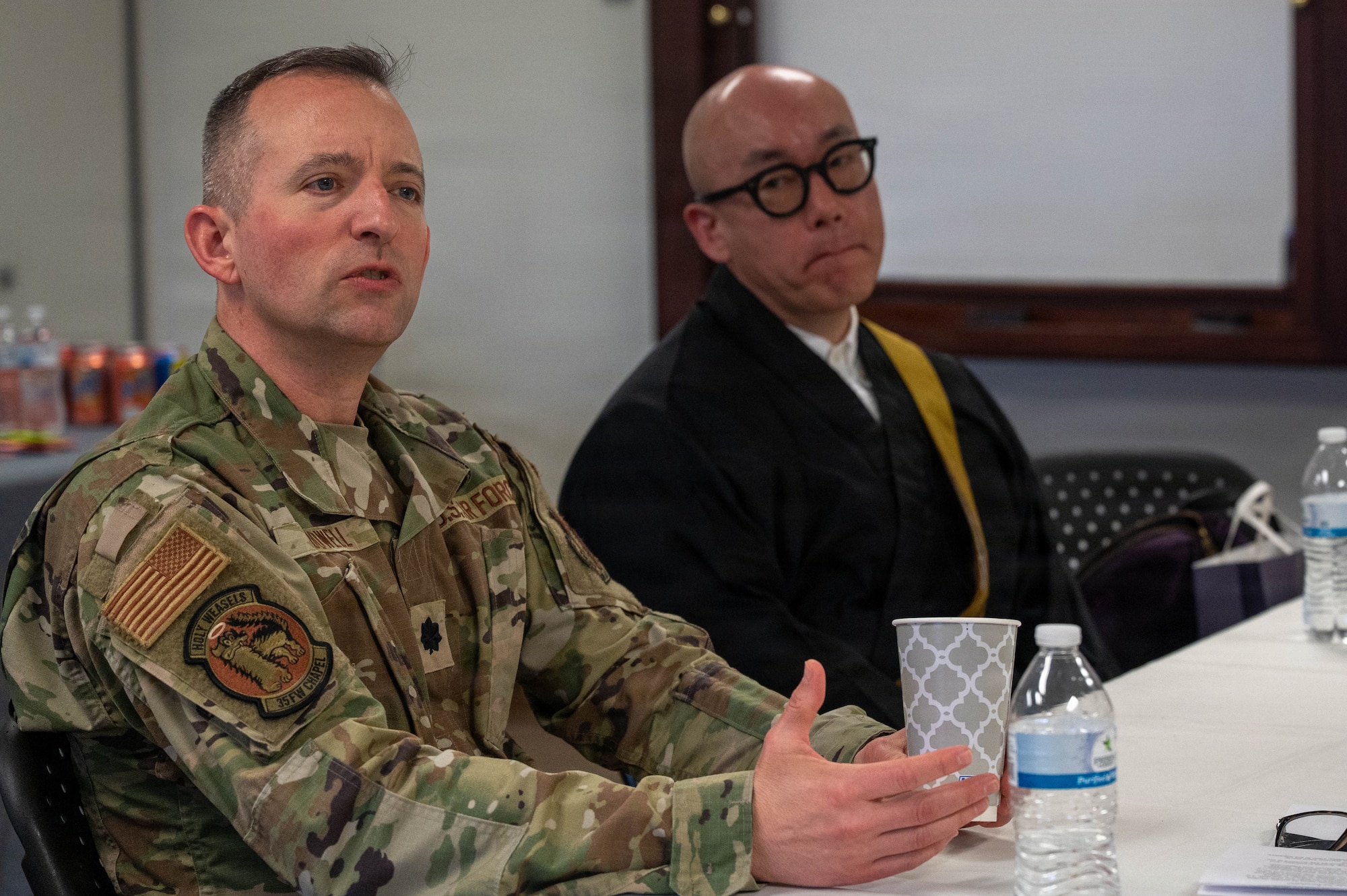 Lt. Col. Eli Dowell, 35th Fighter Wing Chaplain, discusses differences in military and Japanese Chaplains during a Chaplain Exchange at Misawa Air Base, Japan, Feb 26th, 2026
