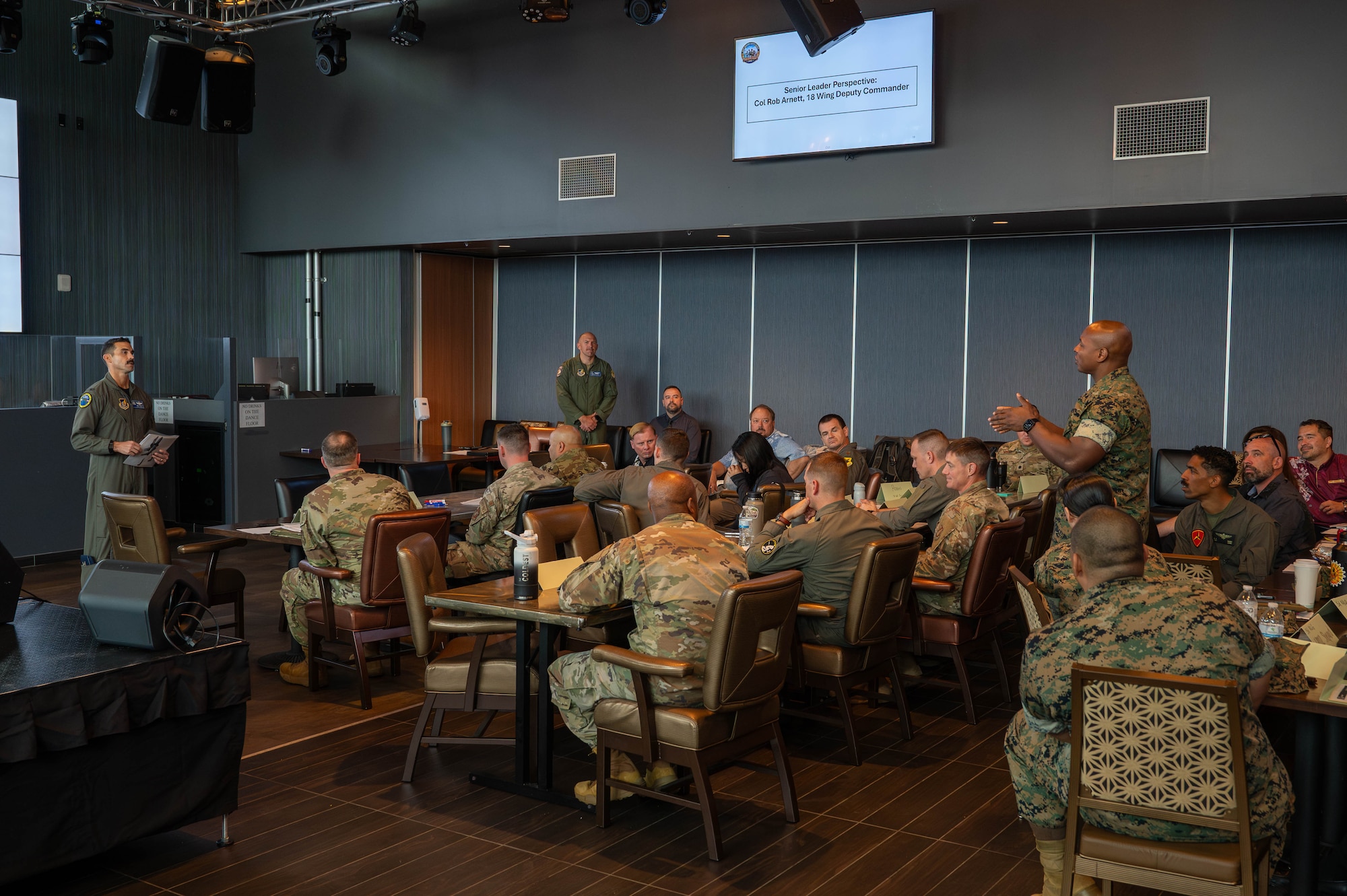 U.S. Air Force Col. Robert Arnett, left, 18th Wing deputy commander, answers questions during the inaugural Joint Okinawa Safety Summit at Kadena Air Base, Japan, March 20, 2026. The summit brought together more than 40 safety professionals from 11 organizations across four services to address shared risks and strengthen joint operations. (U.S. Air Force photo by Airman 1st Class Nathaniel Jackson)