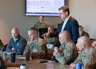 John Griese, senior wargame designer and facilitator supporting the National Guard Bureau’s Wargaming and Analysis Branch, addresses Wisconsin Department of Military Affairs personnel taking part in the National Guard’s Presidio Endeavor wargame at the Armed Forces Reserve Center in Madison, Wisconsin, March 12, 2026.