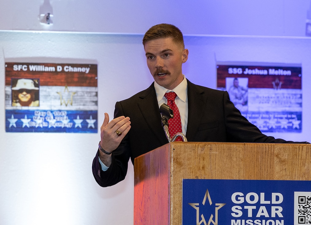 Illinois Army National Guard 1st Lt. Jacob Harris encourages Gold Star Mission scholarship recipients to learn the story about the name on their scholarship during the Gold Star Mission Scholarship banquet in Springfield March 21.