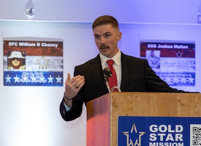 Illinois Army National Guard 1st Lt. Jacob Harris encourages Gold Star Mission scholarship recipients to learn the story about the name on their scholarship during the Gold Star Mission Scholarship banquet in Springfield March 21.