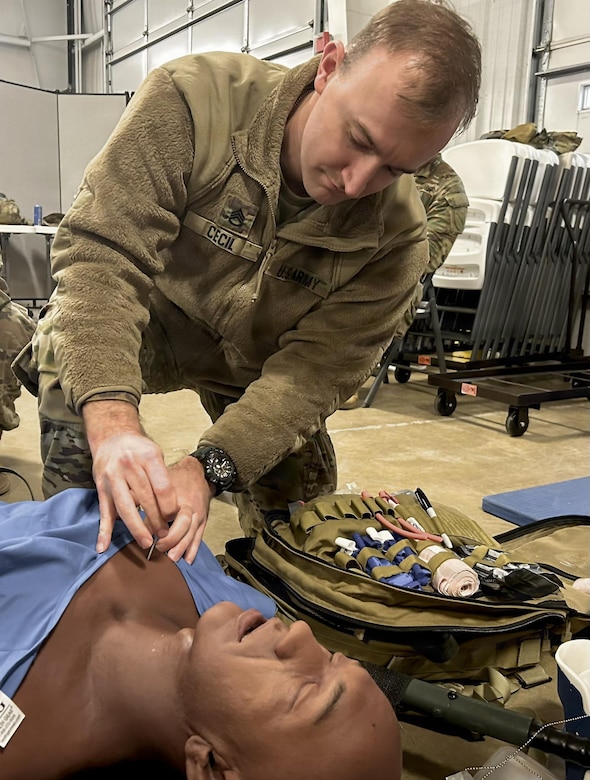 U.S. Army Staff Sgt. Colin Cecil, with the 138th Operations Fires Command, uses a needle chest compression during 68W combat medic recertification course held at Wendell H. Ford Regional Training Center March 2, 2026.