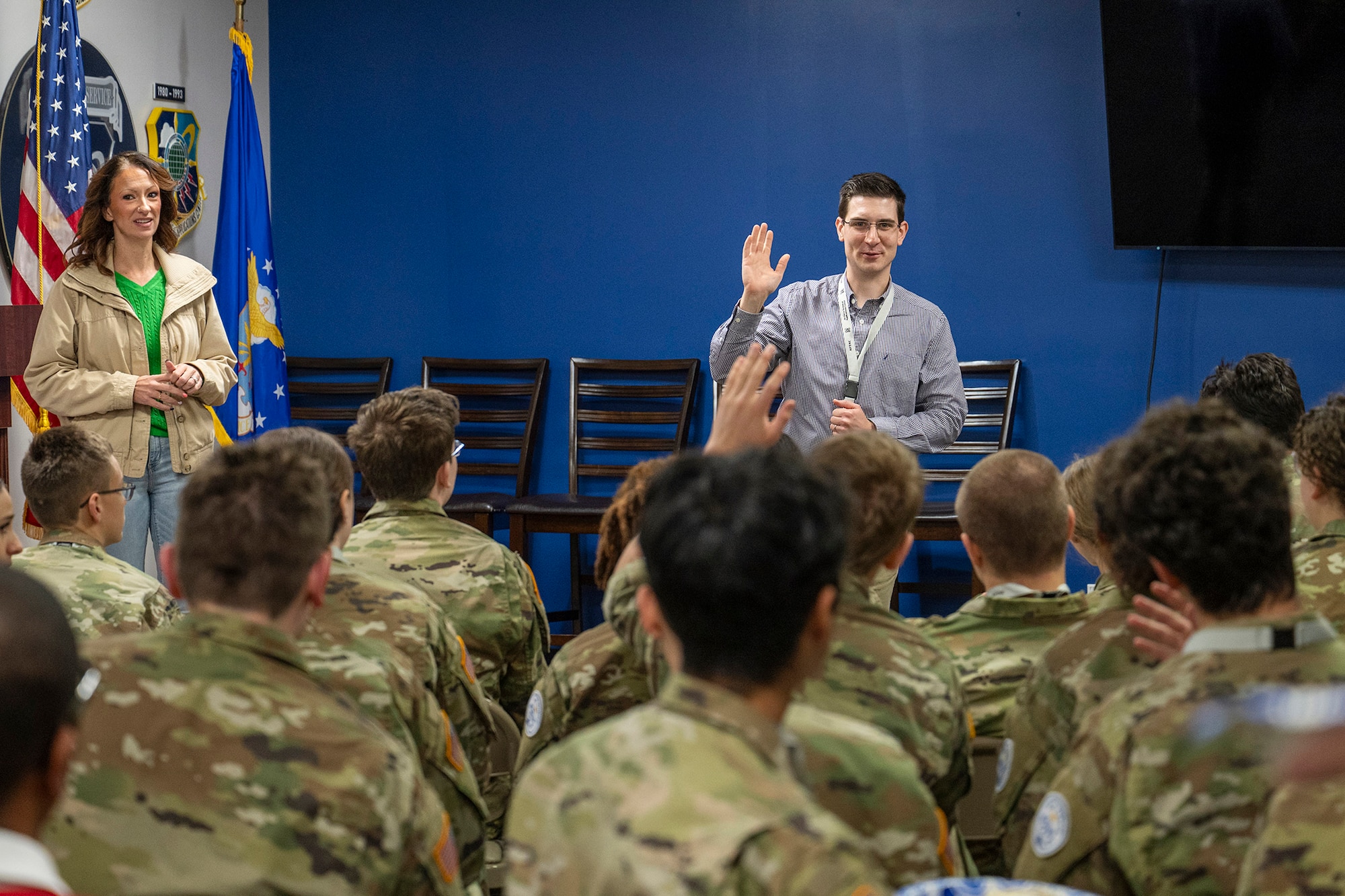 Paul Cook, historian for the Air Force Technical Applications Center at Patrick Space Force Base, Fla., takes a question from a Junior Reserve Officer Training Corps cadet during a visit to the Department of War’s sole nuclear surveillance center of excellence March 17, 2026.  The cadets, from Detachment FL-43 at Vero Beach High School, Fla., spent the day learning about possible career opportunities in the Air Force.  Also pictured (far left) is Erica Sansosti, AFTAC’s project officer for the visit.  (U.S. Air Force photo by Matthew S. Jurgens)