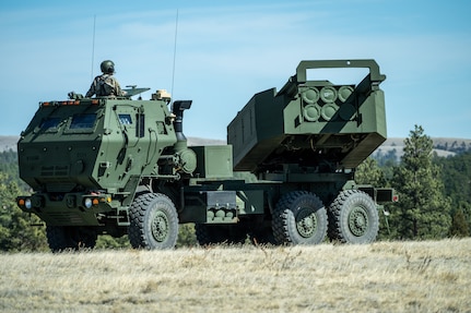 Spc. Justin Gorecki, a 13M transition course student assigned to the 182nd Forward Support Company, Michigan National Guard, operates a High Mobility Artillery Rocket System during a field training exercise at Camp Guernsey, Wyoming, March 20, 2026.