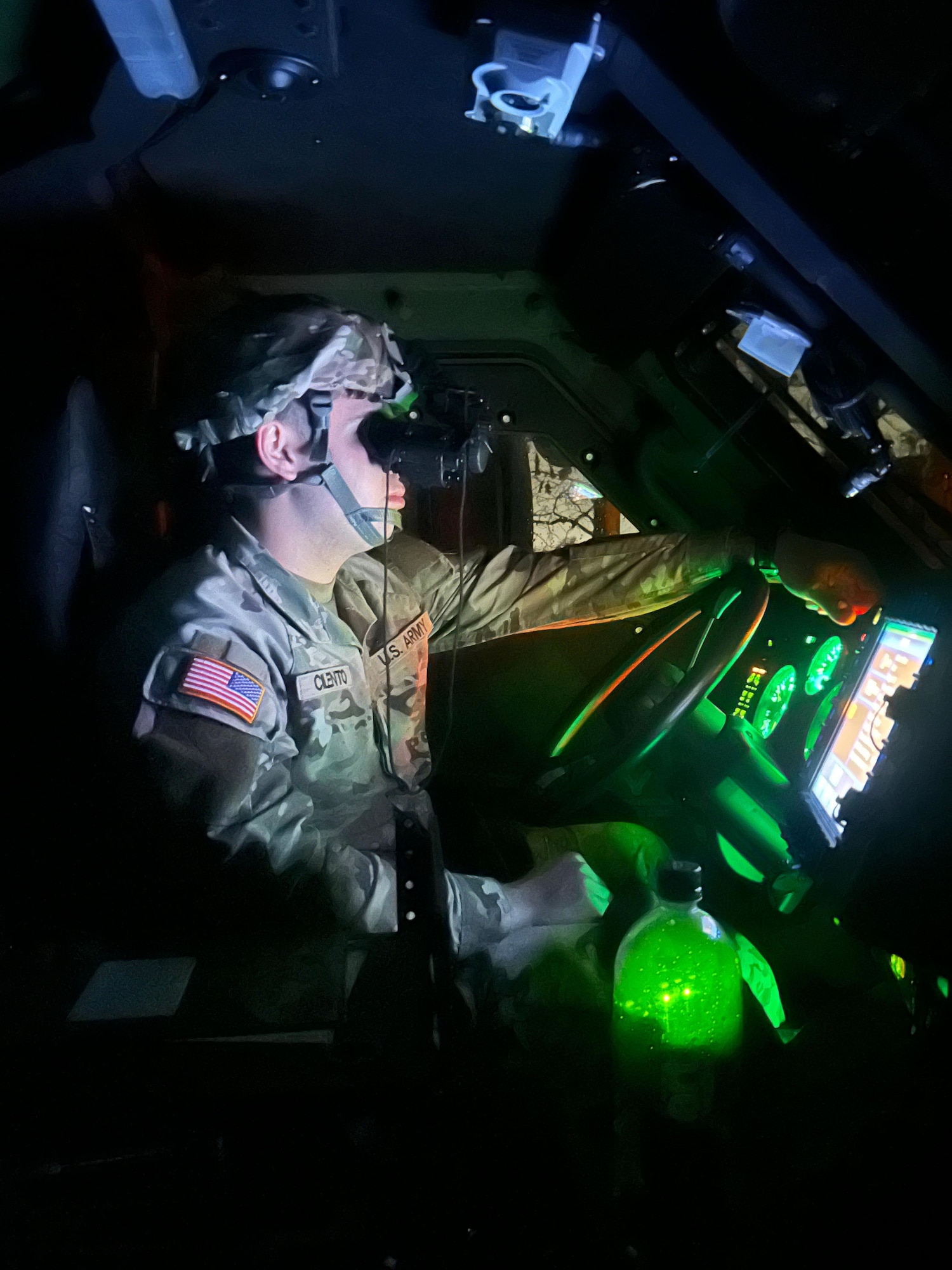 A U.S. Army Reserve Soldier from the 961st Movement Control Team, 77th Sustainment Brigade, executes night driving training during Exercise Liberty Victory at Joint Base McGuire-Dix-Lakehurst, N.J., March 13, 2026. Members of the 961st MCT were among the more than 1,000 “Liberty Warriors" assigned to the 77th SB who participated in the field training exercise, which focused on building combat readiness, reinforcing warfighter skills and preparing personnel for real-world deployments. (Courtesy photo)