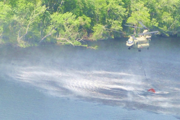 HUNTER ARMY AIR FIELD, Savannah, Ga. Apr. 25, 2013 – Chinook Flight Engineers from Spain’s Army Air Force crossed the pond to train with some of the Army National Guard’s finest before deploying to Afghanistan. Georgia’s Army National Guard Chinook unit out of Savannah hosted the Spaniards and conducted a variety of training including sling load operations, pinnacle landings, dust landings, confined area operations, and water bucket operations.

 

(Georgia Army National Guard photo by Spc. Charles Stevenson / Released)