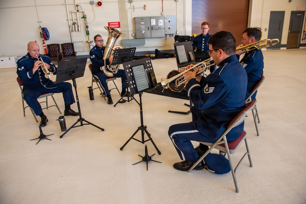 Band members play their instruments during ceremony