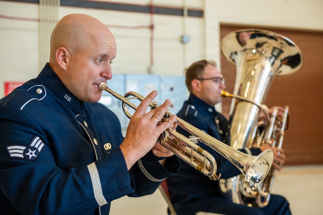 Band members play their instruments during ceremony