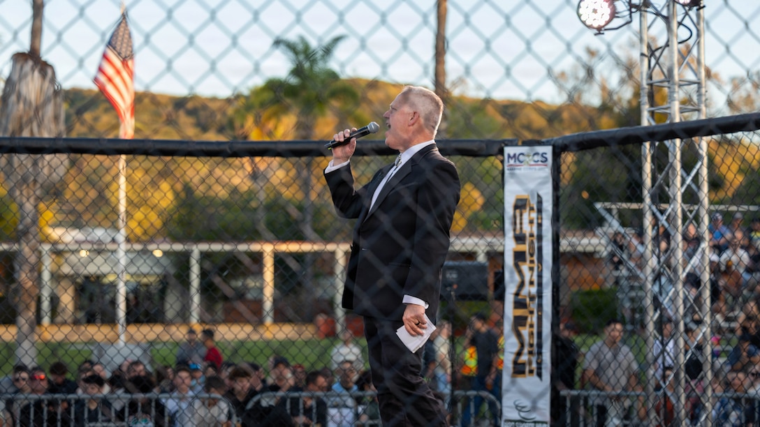 Mike Hart, a news reporter at ABC News, presents fighters during the MMA Fight Night at Marine Corps Base Camp Pendleton, Calif., March 20, 2026. The event was coordinated by Marine Corps Community Services to promote base cohesion, increase morale and provide entertainment. (U.S. Marine Corps photo by Lance Cpl.  Estada)