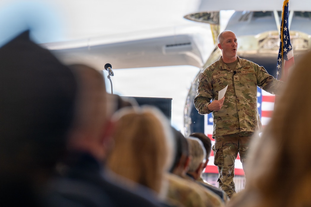 Wing commander delivers remarks during a ceremony