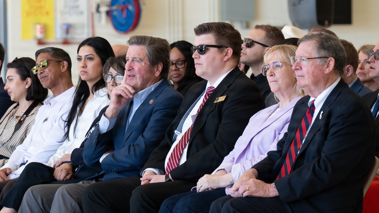 Community leaders attend a ceremony