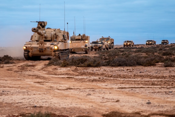 A U.S. Army M109A6 Paladin howitzer with the Thomson-based Bravo Battery, 1st Battalion, 214th Field Artillery, 648th Maneuver Enhancement Brigade, Georgia Army National Guard, moves into firing position during African Lion 2021, at the Tan Tan Training Area, Morocco, June 13, 2021. African Lion is U.S. Africa Command’s largest, premier, joint, annual exercise hosted by Morocco, Tunisia and Senegal, 7-18 June. More than 7,000 participants from nine nations and NATO train together with a focus on enhancing readiness for U.S. and partner nation forces. AL21 is a multi-domain, multi-component, and multi-national exercise, which employs a full array of mission capabilities with the goal to strengthen interoperability among participants. (U.S. Army National Guard photo by Sgt. 1st Class R.J. Lannom Jr.)