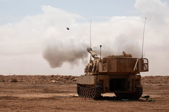 A U.S. Army M109A5 Paladin howitzer from the 1st Battalion, 214th Field Artillery Regiment fires rounds during the African Lion 2021 distinguished visitor event near Cap Draa, Morocco, June 18, 2021. African Lion 2021 is U.S. Africa Command's largest, premier, joint, annual exercise hosted by Morocco, Tunisia, and Senegal, 7-18 June. More than 7,00 participants from nine nations and NATO train together with a focus on enhancing readiness for U.S. and partner nation forces. AL21 is multi-domain, multi-component, and multinational exercise, which employs a full array of mission capabilities with the goal to strengthen interoperability among participants. (U.S. Army photo by Sgt. Nathan Baker)
