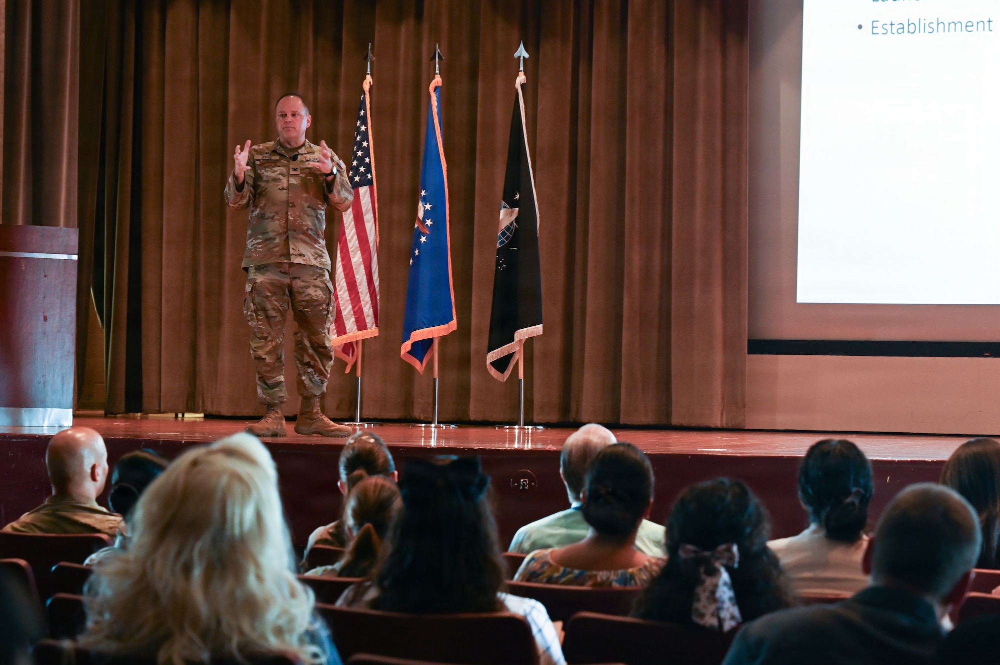 U.S. Space Force Col. James T. Horne III, Space Launch Delta 30 commander, addresses an audience.