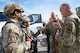 U.S. Air Force Gen. Dale R. White fist bumps a 91st Missile Security Forces defender.