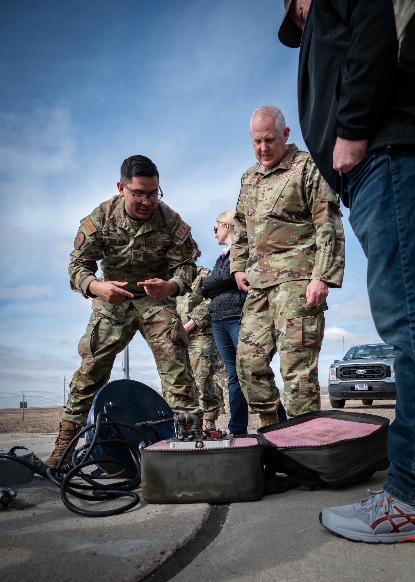 U.S. Air Force Tech. Sgt. Jaime Kerr briefs U.S. Air Force Gen. Dale R. White.