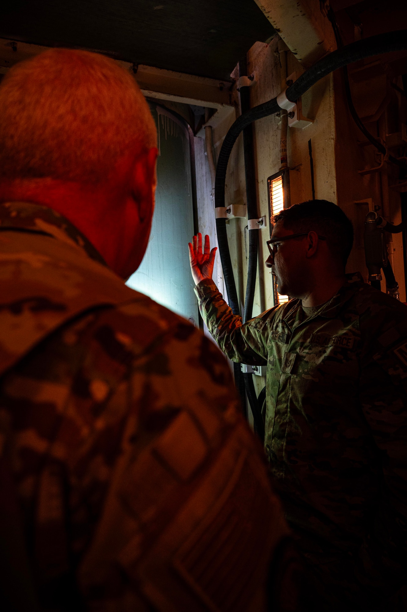 U.S. Air Force Tech. Sgt. Jaime Kerr briefs U.S. Air Force Gen. Dale R. White.