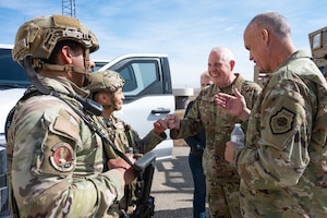U.S. Air Force Gen. Dale R. White fist bumps a 91st Missile Security Forces defender.