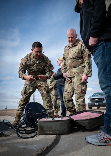 U.S. Air Force Tech. Sgt. Jaime Kerr briefs U.S. Air Force Gen. Dale R. White.