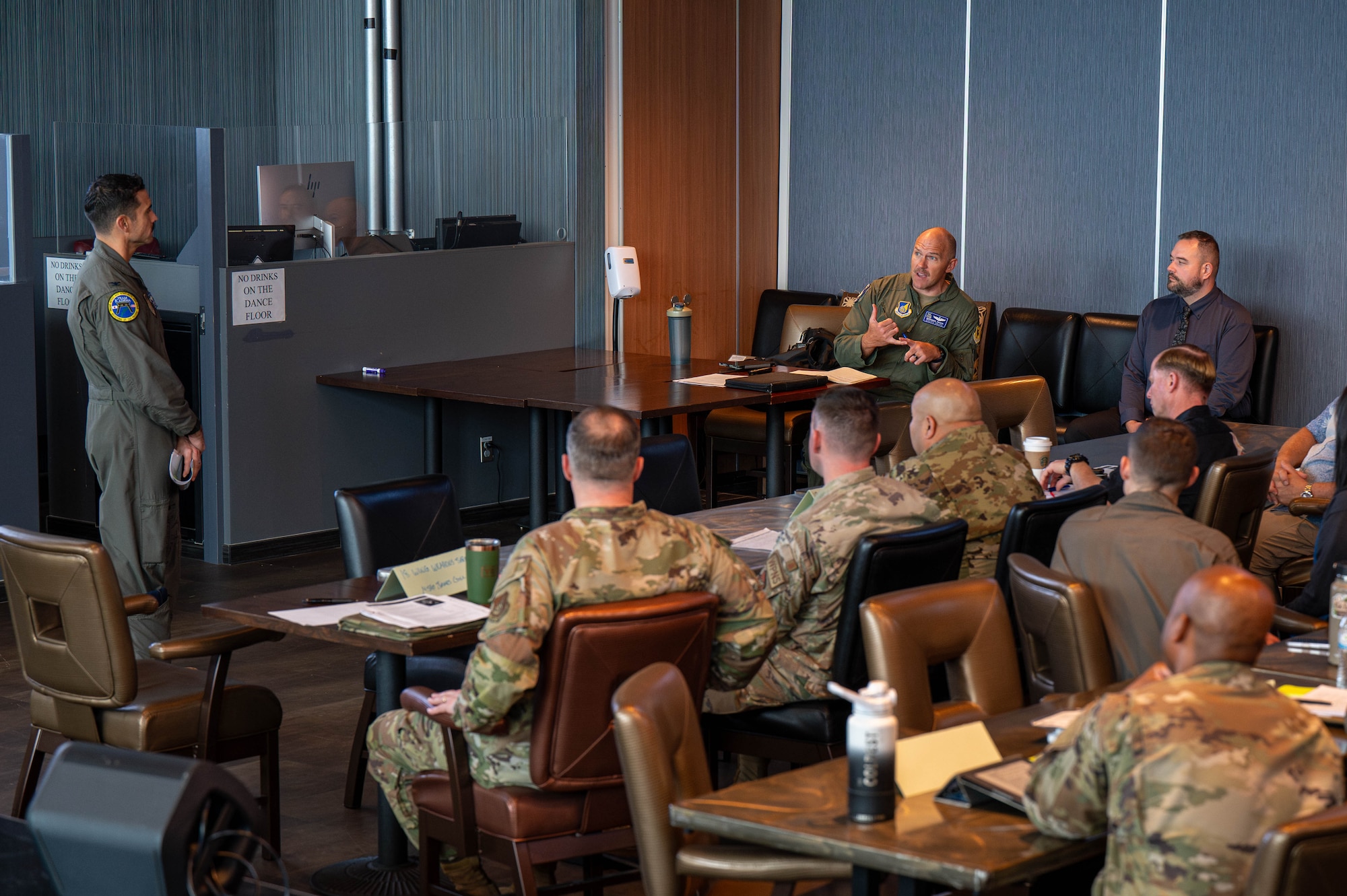 U.S. Air Force Lt. Col. Brandon Krupa, right, 18th Wing chief of safety, speaks with U.S. Air Force Col. Robert Arnett, 18th Wing deputy commander, during the inaugural Joint Okinawa Safety Summit at Kadena Air Base, Japan, March 20, 2026. Leaders emphasized collaboration and proactive risk management across the joint force. (U.S. Air Force photo by Airman 1st Class Nathaniel Jackson)