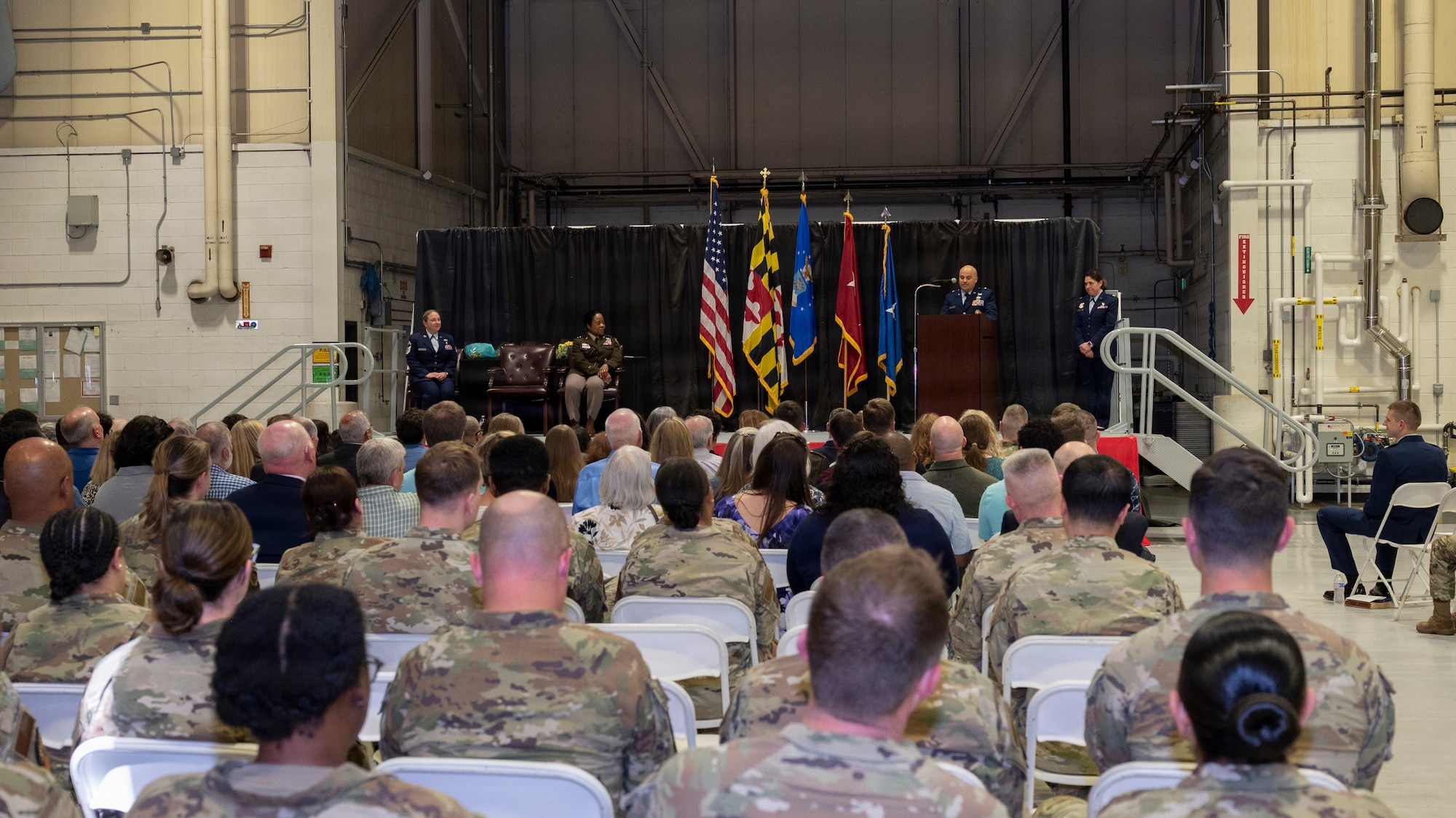 Maryland Air National Guard Brig. Gen. Joed Carbonell-López, commander of the 175th Wing, speaks to the many attendees during his promotion ceremony at Warfield Air National Guard Base at Martin State Airport, Maryland, March 22, 2026. Carbonell-López was promoted to brigadier general surrounded by friends, family, and fellow Airmen. (U.S. Air National Guard photo by Staff Sgt. Alexandra Huettner)