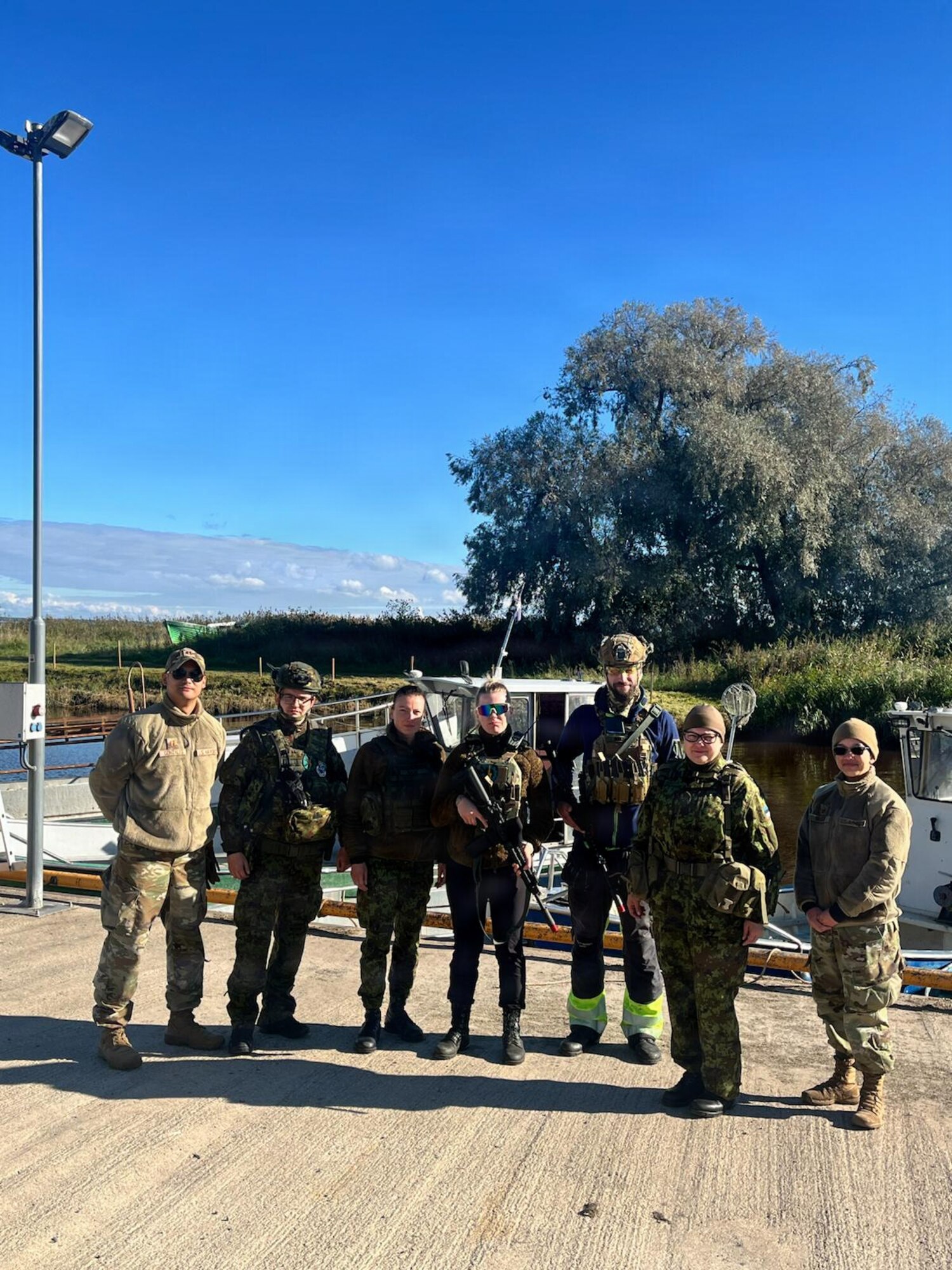 Airmen of the Maryland National Guard and soldiers of the Estonian Defense League pose for a group photo in Haapsalu, Estonia, September 27, 2025. Members shared best practices with EDL soldiers to test the mobilization defense plan while utilizing convoy operations. Members shared best practices with EDL soldiers to test the mobilization defense plan while utilizing convoy operations  as part of Exercise Hurricane, which included participants from Estonia, Latvia, France and the U.K. (Courtesy Photo)