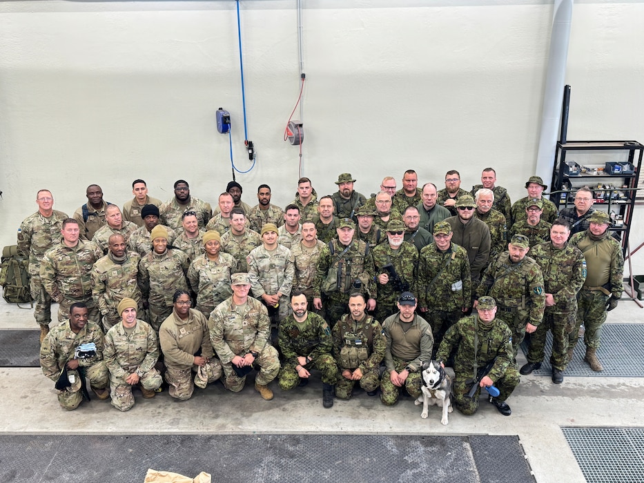 Airmen and Soldiers of the Maryland National Guard and soldiers of the Estonian Defense League pose for a group photo in Pärnu, Estonia, September 28, 2025. Members shared best practices with EDL soldiers to test the mobilization defense plan while utilizing convoy operations. Members shared best practices with EDL soldiers to test the mobilization defense plan while utilizing convoy operations  as part of Exercise Hurricane, which included participants from Estonia, Latvia, France and the U.K. (Courtesy Photo)