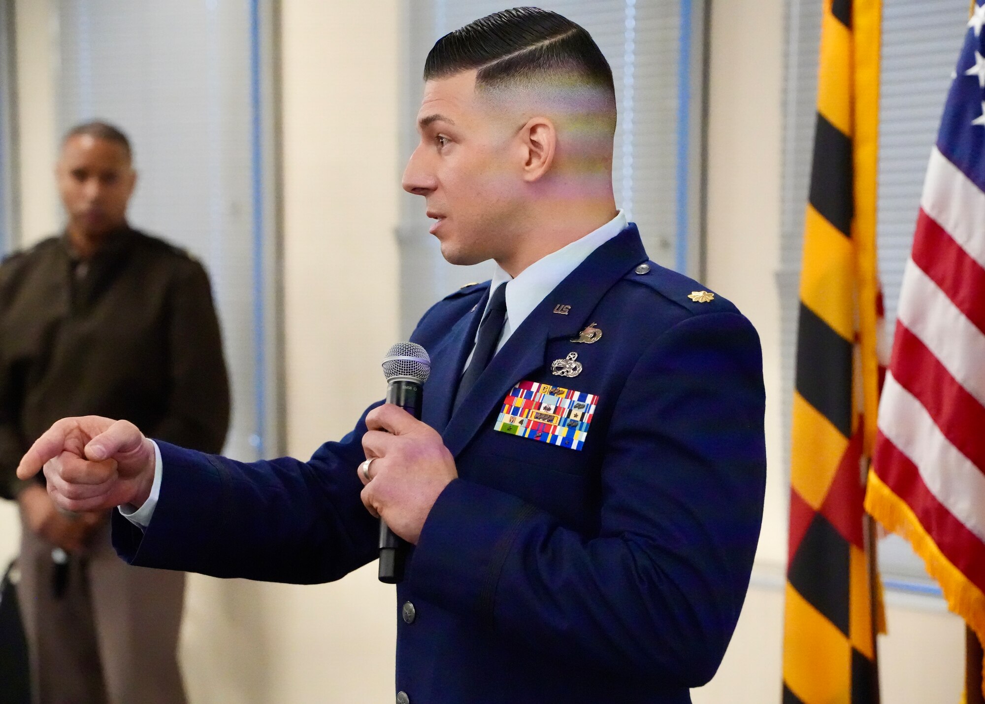Maryland Air National Guard Maj. Michael Dezinna, director of operations for the 135th Intellgence Squadron, speaks with federal, state, and local industry leaders during a critical infrastructure interagency meeting at the Maryland Department of Information Technology in Crownsville, Maryland, March 9, 2026. Hosted by the Maryland National Guard, the engagement was designed to build on the success of Maryland’s first state-led critical infrastructure cyber resilience workshop held in August 2025, which focused on the water and wastewater sector and convened more than 200 cybersecurity and infrastructure experts to improve collective cyber defense across government and industry. (U.S. Air National Guard Photo by Maj. Benjamin Hughes)