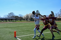 U.S. Air Force Senior Airman Camari Parker, a ceremonial guardsman assigned to the U.S. Air Force Honor Guard, catches a touchdown during the Battle of the Bases flag football tournament at Joint Base Anacostia-Bolling, Washington, D.C., March 21, 2026.