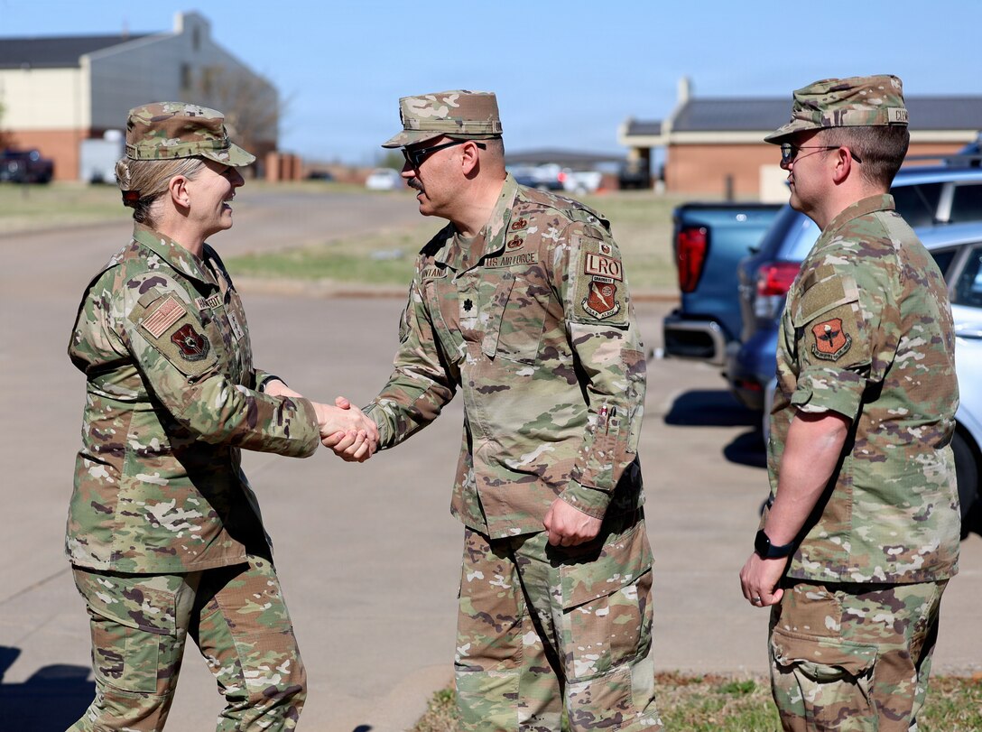 Lt. Gen. Jennifer Hammerstedt, commander of Air Force Sustainment Center, is welcomed to the petroleum, oils and lubricants (POL) schoolhouse by Lt. Col. Jose Quintanilla.