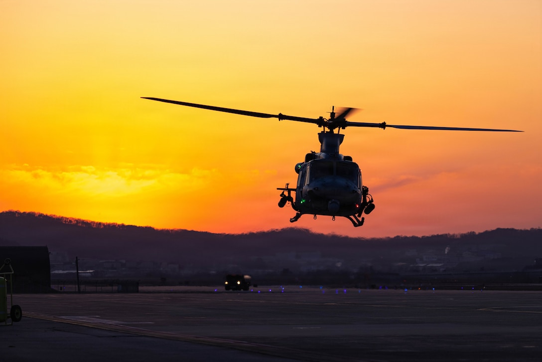 A U.S. Marine Corps UH-1Y Venom with Marine Light Attack Helicopter Squadron 369, Marine Aircraft Group 36, 1st Marine Aircraft Wing lands at Osan Air Base, Gyeonggi-do, South Korea in preparation for KMEP 26.1, March 19, 2026. KMEP is a semi-annual exercise that provides iterative opportunities for Republic of Korea Marine Corps and U.S. Marine Corps units to train together, improving their combined capabilities to deter threats and maintain peace on the Korean Peninsula. (U.S. Marine Corps photo by Lance Cpl. Carlos Paz-Sosa)