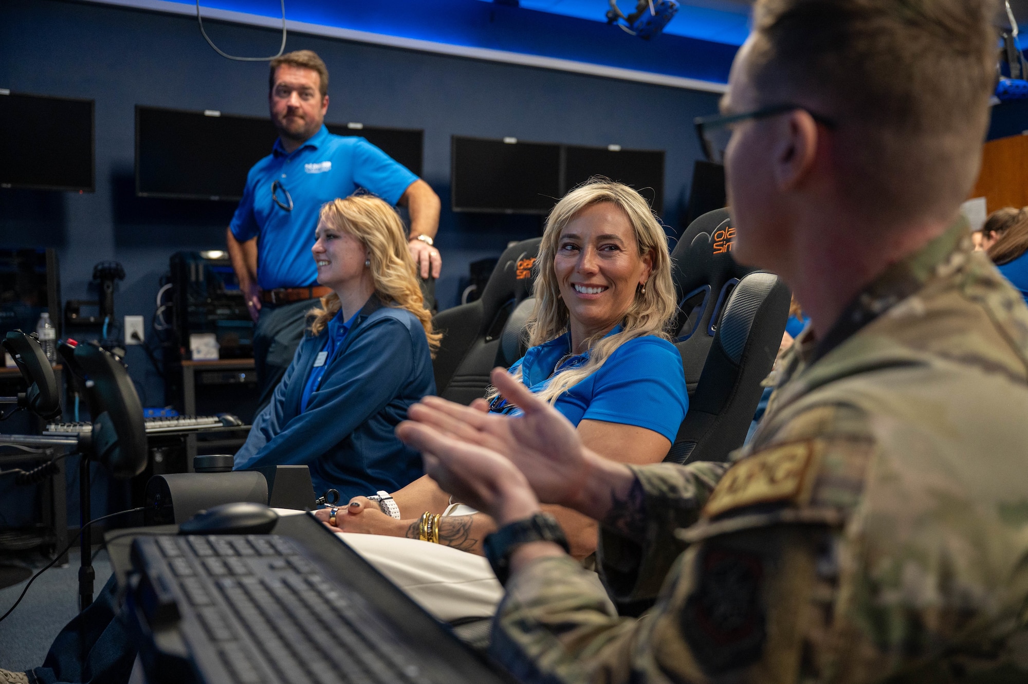 Leadership Abilene Class of 2026 participants learn how to operate a C-130J Super Hercules flight simulator at Dyess Air Force Base, Texas, March 19, 2026. The experience provided insight into aircrew training and the capabilities of the C-130 during the annual ‘Dyess Day’ tour. (U.S. Air Force photo by Airman 1st Class William Neal)
