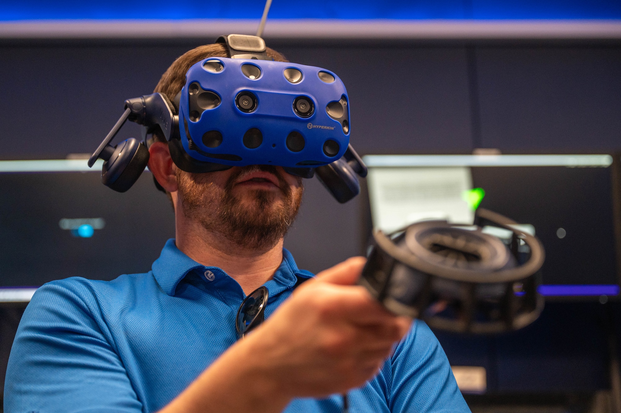 A member of the Leadership Abilene Class of 2026 uses a virtual reality system to explore a C-130J Super Hercules at Dyess Air Force Base, Texas, March 19, 2026. The guided tutorial provided insight into simulated maintenance training for the C-130. (U.S. Air Force photo by Airman 1st Class William Neal)