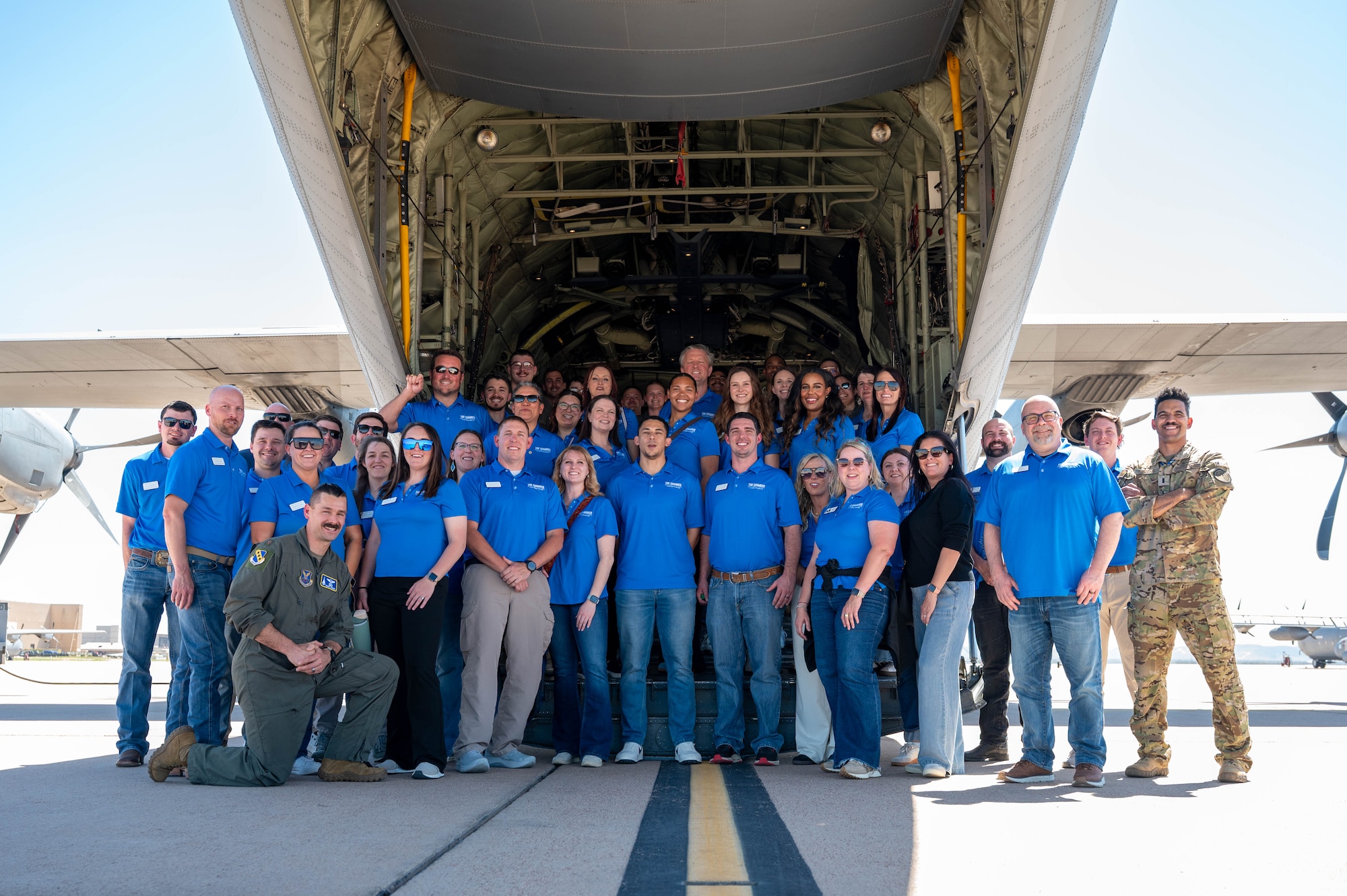 Members of the Leadership Abilene Class of 2026 pose for a photo behind a C-130J Super Hercules at Dyess Air Force Base, Texas, March 19, 2026.  The group visited the installation for the annual ‘Dyess Day,’ an event designed to inform influential local leaders about the diverse missions at Dyess. (U.S. Air Force photo by Airman 1st Class William Neal)
