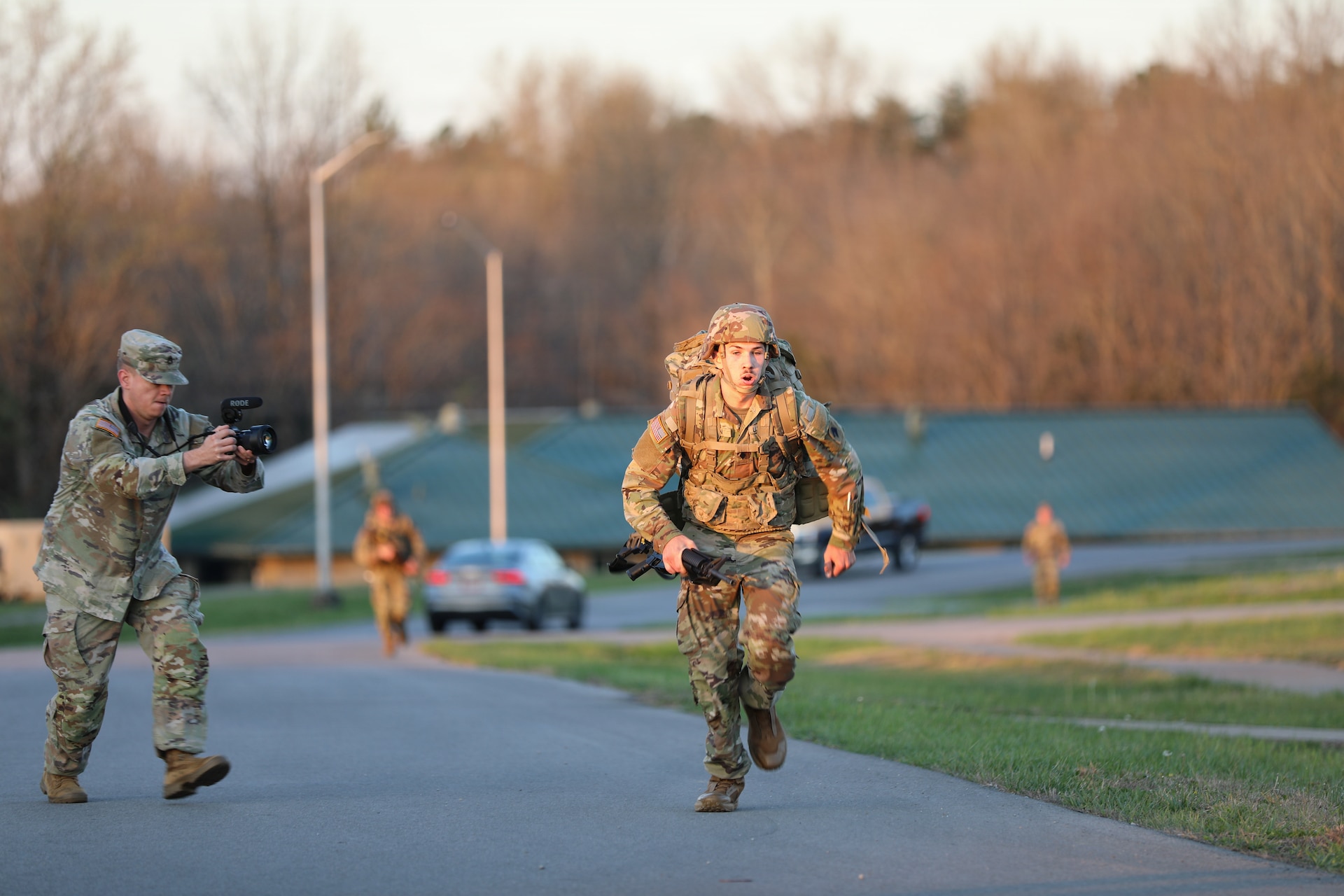 Spc. Caleb Green, Headquarters and Headquarters Battery, 138th Operational Fires Command, rushes toward the finish line of the ruck march at Wendel H. Ford Regional Training Center during the 2026 Best Warrior Competition March 22, 2026.