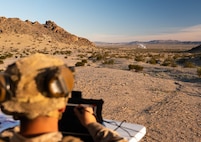 Marine looking at and operating OPF-L drone