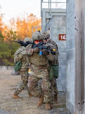 U.S. Air Force Airmen, with the 116th Security Forces Squadron, Georgia Air National Guard, assault the target area during a training exercise at Robins Air Force Base, Georgia Feb 7, 2026. This training improves the members efficiency and lethality during urban engagements. (U.S. Air National Guard photo by Master Sgt. Jeff Rice)