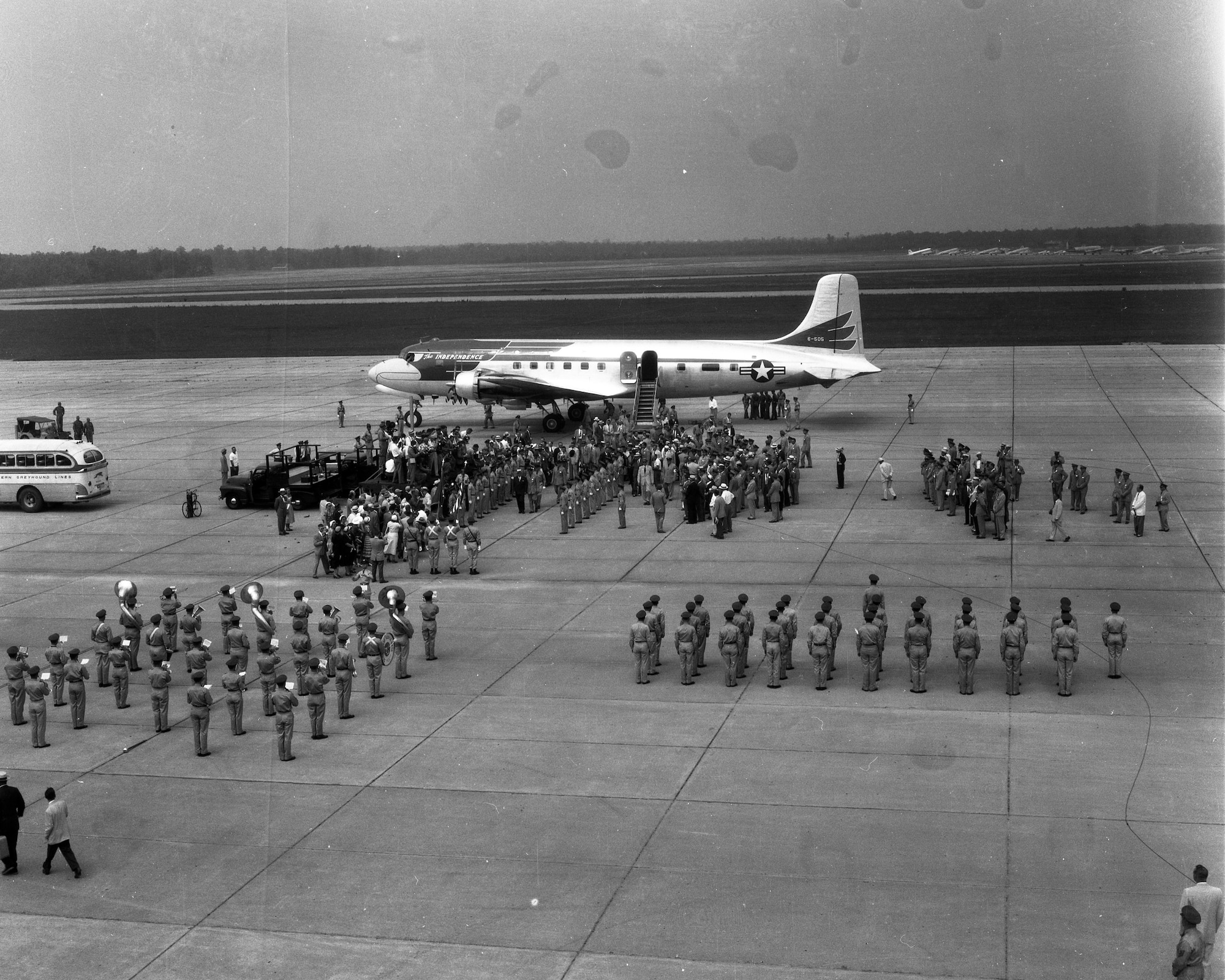Then-President Harry Truman is welcomed as he exits the Independence, the 1950s version of Air Force One, upon his arrival at Northern Field near Tullahoma, Tenn., June 25, 1951. Truman visited middle Tennessee to dedicate the Air Engineering Development Center as the Arnold Engineering Development Center in honor of Gen. Henry “Hap” Arnold. (U.S. Air Force photo)