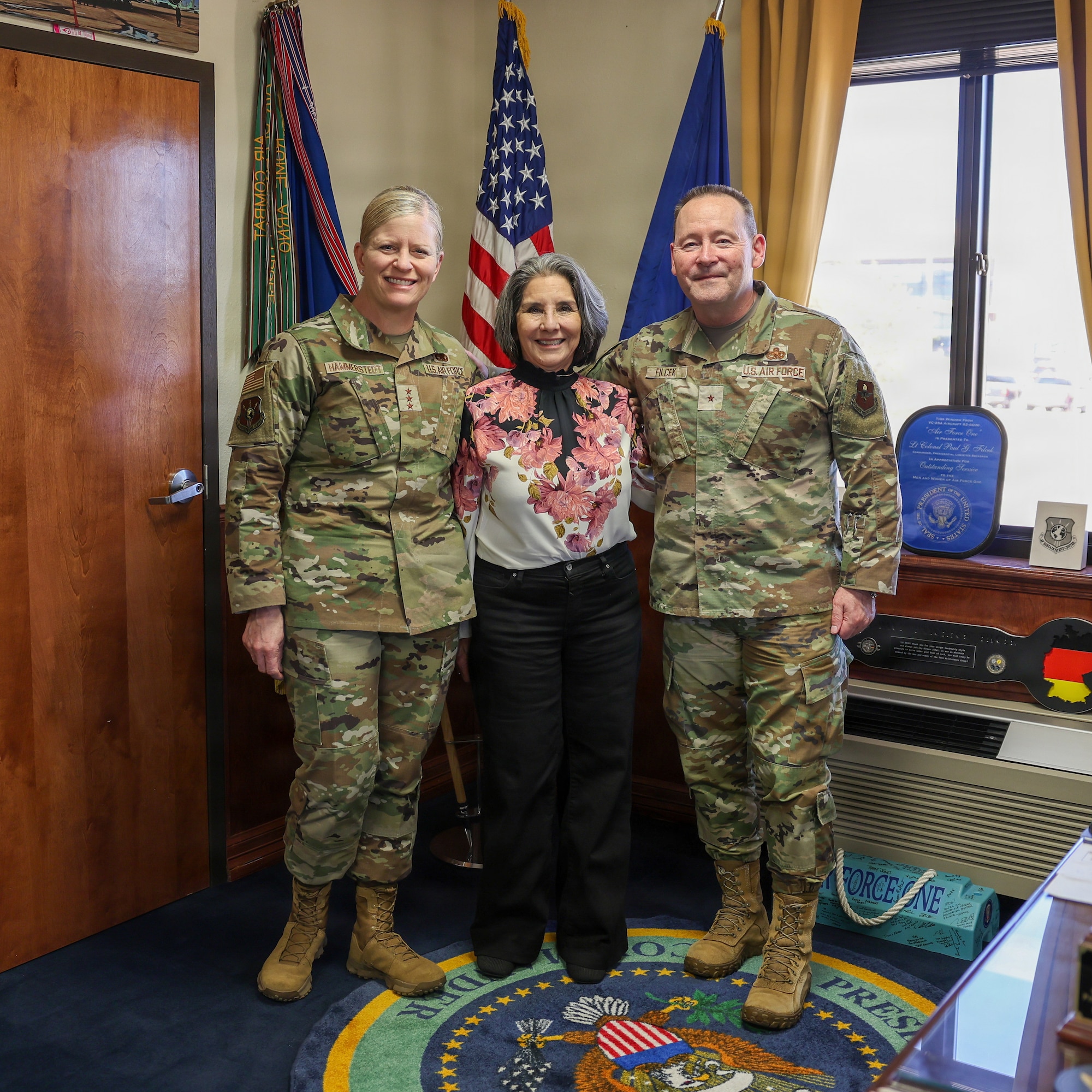 Lt. Gen. Jennifer Hammerstedt, commander of Air Force Sustainment Center; Brig. Gen. Paul Filcek, commander of the 82nd Training Wing; and Patricia Knighten, daughter of Lt. Gen. Leo Marquez, pose for a photo.