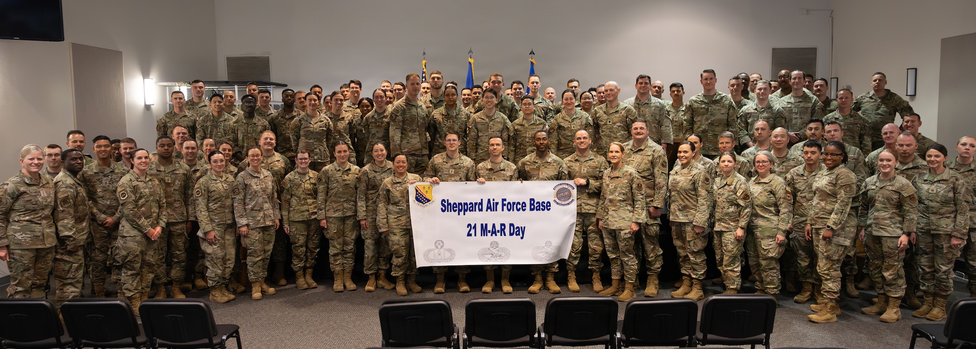 Lt. Gen. Jennifer Hammerstedt, commander of Air Force Sustainment Center, takes a group photo with future maintenance and logistics officers.