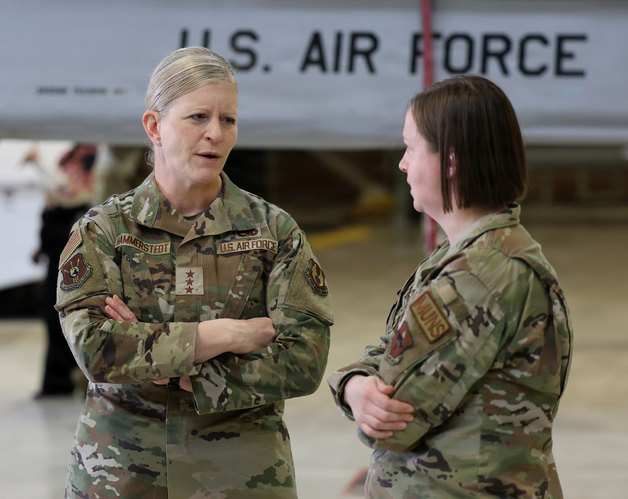 Lt. Gen. Jennifer Hammerstedt, commander of Air Force Sustainment Center, speaks with Maj. Megan Olson, commander of the 363rd Training Squadron.