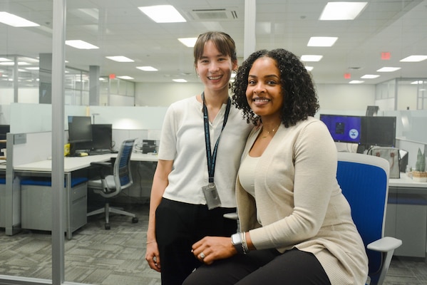 Two people pose for a photo.