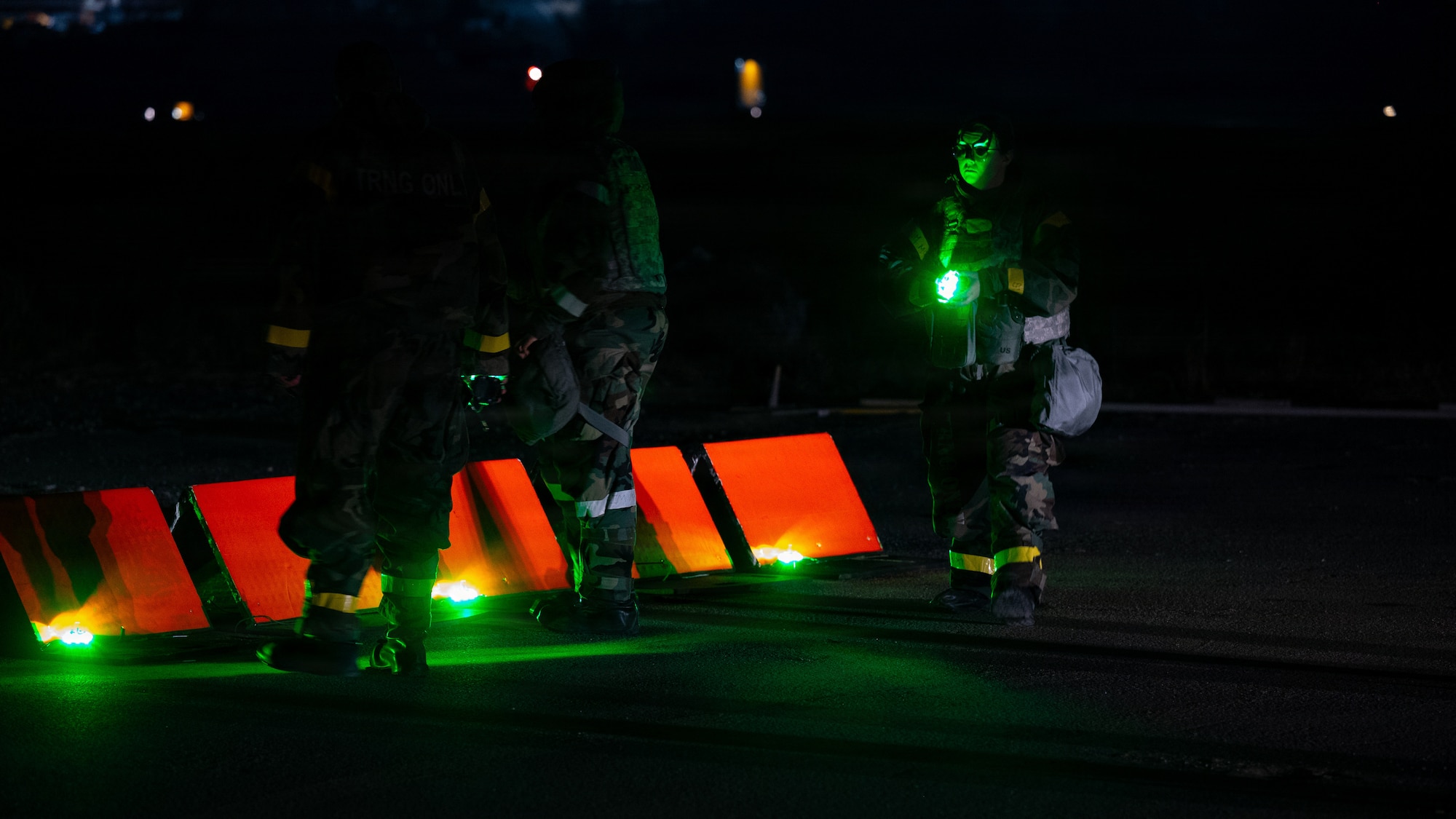 U.S. Air Force Airmen assigned to the 51st Operations Support Squadron and the 51st Civil Engineer Squadron test a lighting system on a minimum operating strip during exercise Freedom Shield 26 at Osan Air Base, Republic of Korea