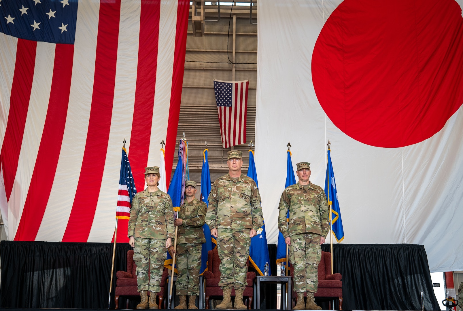 U.S. Air Force Lt. Gen. Laura Lenderman, Pacific Air Forces deputy commander, Lt. Gen. Joel Carey, 5th Air Force incoming commander, and Lt. Gen. Stephen Jost, outgoing 5th Air Force commander stand during the 5AF change of command ceremony at Yokota Air Base, Japan, March 24, 2026. This momentous change to the 5AF structure demonstrates the Department’s commitment to Japan and maintaining the security and stability in DoD’s priority theater. (U.S. Air Force photo by Airman 1st Class Kayla Karelas)