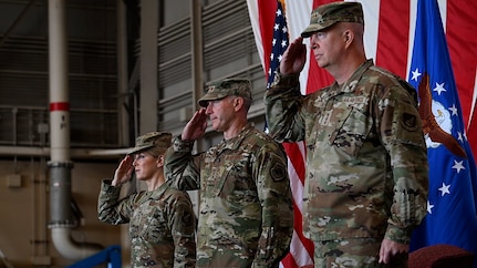 U.S. Air Force Lt. Gen Joel Carey, 5th Air Force incoming commander, Lt Gen Stephen Jost, outgoing commander, and Lt Gen Laura Lenderman, Pacific Air Forces deputy commander, render a salute during the national anthem during a change of command ceremony at Yokota Air Base, Japan, March 24, 2026. 5 AF's commander separation is designed to enable more flexible joint and bilateral operations with the JASDF. This shift to a more distributed and resilient posture will enhance the alliance's ability to deter threats and respond to crises together. (U.S. Marine photo by Sgt. Mitchell Johnson)