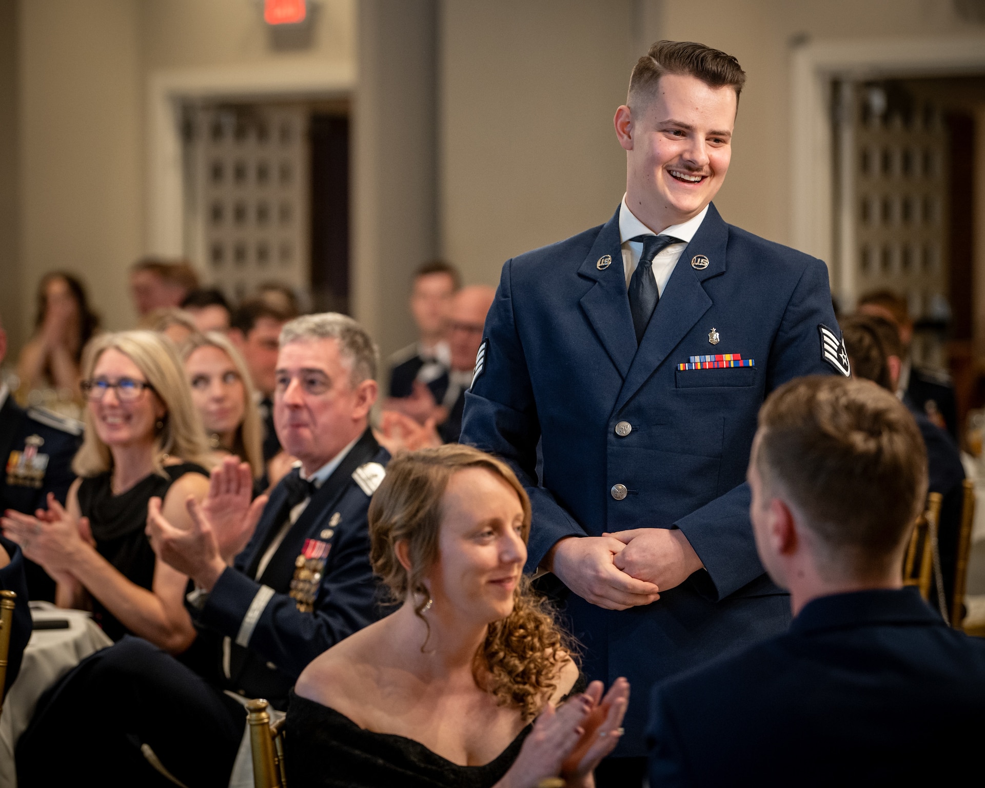 Senior Airman Ethan Greco, the Kentucky Air National Guard’s 2026 Airman of the Year, is recognized during the Airman’s Gala at Wildwood Country Club in Louisville, Ky., March 14, 2026. The Gala celebrated wing Airmen who displayed exceptional performance and community engagement in 2025. (U.S. Air National Guard photo by Master Sgt. Joshua Horton)
